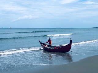 Indonesia, Aceh-15 October 2024, Beautiful beach views and fishermen in the Aceh sea.