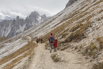 Mother and daughter sharing an adventure in the Dolomites, surrounded by stunning alpine landscapes