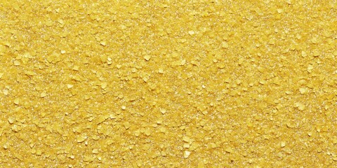 Close-up of golden glitter, shimmering and reflecting the light.