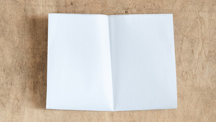 Newspaper on wooden background