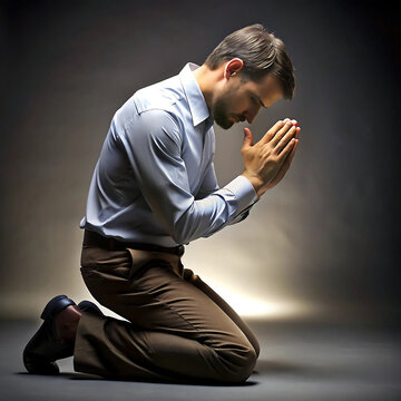 man on his knees praying