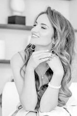 Obraz premium Stunning black and white portrait of a beautiful woman. Confident and happy. Beauty concept