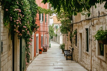 Obraz premium A picturesque alleyway adorned with flowers and charming buildings.