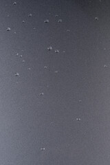 Metallic grey shiny background with water drops