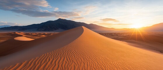 A stunning view of massive sand dunes in a tranquil desert landscape under a beautiful sunset, showcasing nature's serene beauty and vastness.