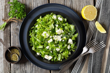 Classic Greek green lettuce salad with feta cheese