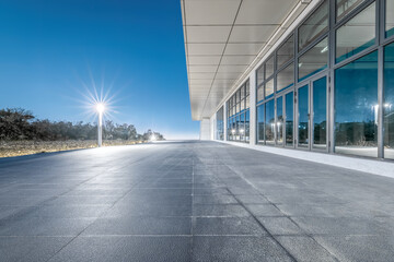Empty brick floor and commercial building background