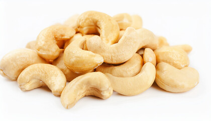 Fototapeta premium Heap of cashews isolated on white backdrop. Healthy and tasty snack. Super food.