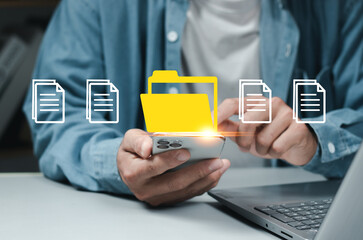 Efficient document management system for Business online file access and collaboration, businessman touch folder and document icon software, Cloud document management business processes and sharing.