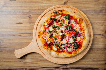 italian pizza on the wooden board