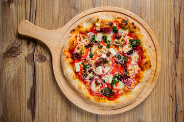 italian pizza on the wooden board