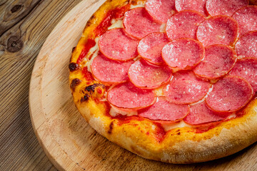 italian pizza on the wooden board
