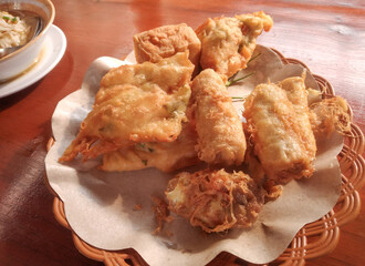 Aneka Gorengan or various fried food. Fried is a term that includes various types of food that are dipped in flour batter and then deep fried in lots of hot cooking oil.