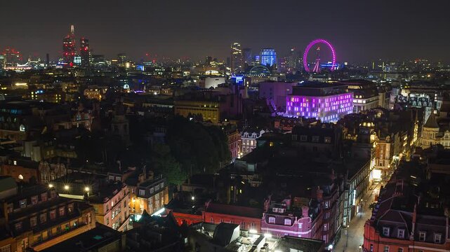 Aerial timelapse video capturing Berwick's illuminated cityscape with evening lights and urban night scenery in the United Kingdom.