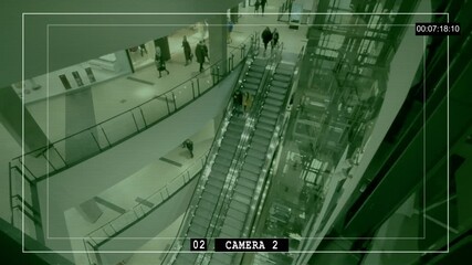 Screen interface of surveillance camera monitor in mall. Surveillance camera video. eople going up the escalator. High quality FullHD footage