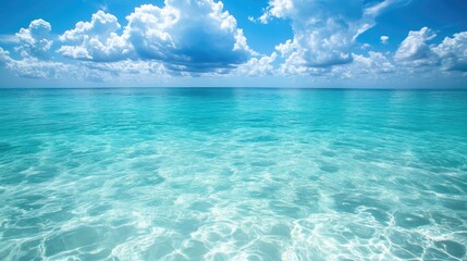 Obraz premium Crystal-clear waters of the Caribbean with large, blank sky for copy space