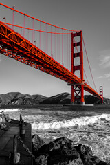 Wide-angle shot of the world-famous Golden Gate Bridge in San Francisco, California. Black and...