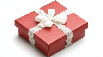 Obraz premium Na białym tle widoczny jest zjawiskowy czerwony prezent, który wyróżnia się prostotą i elegancją. 