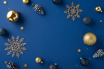 Explore elegant Christmas decorations on a deep blue background, featuring golden snowflakes, ornaments, and stars. Perfect for crafting holiday ambiance and seasonal celebrations