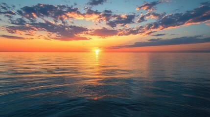 Obraz premium Quiet sunset over the calm waters of Lake Michigan, with room for copy in the sky