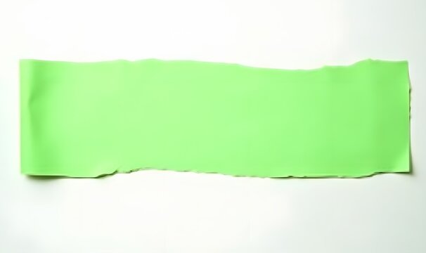 Isolated green paper strips with rips appear on a clean white surface.