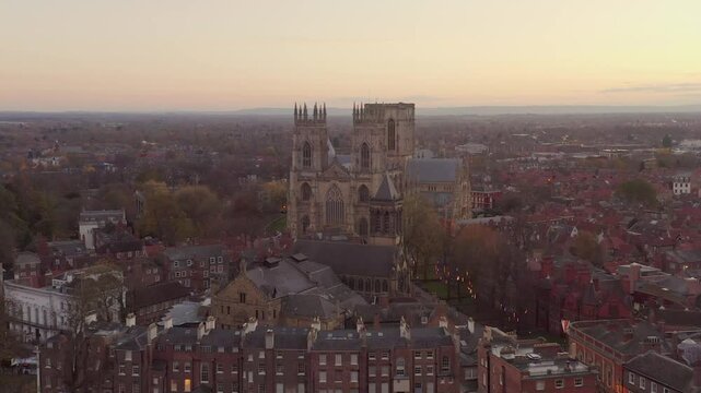 Drone shot of the York Minster and surrounding cityscape at dusk in York, UK