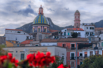 Vietri sul Mare townscape: blue and yellow are the colours of the majolica tiles adorning the dome of Cathedral located at the highest point of the historic centre.