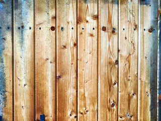 Natural wooden fence with rich textures and tones, perfect for adding rustic charm to any outdoor space or design project