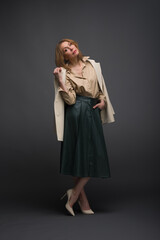 Stylized fashion shoot with elegant outfits and expressive poses.