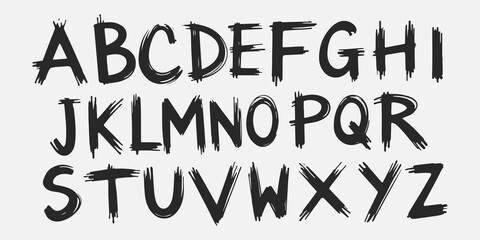 Hand-drawn brush stroke alphabet in black and white