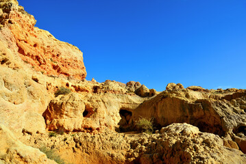 Algar Seco is a rock formation near Carvoeiro the rocks were formed over thousands of years by wind and waves today the resulting caves are a popular tourist destination in the Algarve Portugal