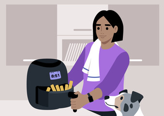 In a cozy kitchen, a young individual joyfully cooks golden fries in an air fryer, with their dog eagerly observing, creating a warm and inviting atmosphere
