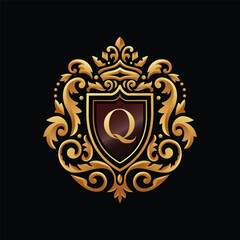 Letter Q inside golden shield with vintage ornament