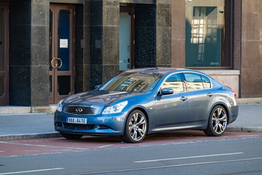 Blue Infiniti G35 (V36) luxury sedan parked on street