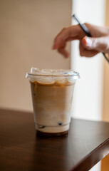 Ice coffee in plastic cup