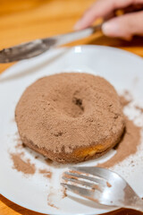 Donut with chocolate powder