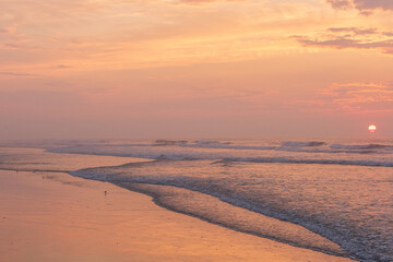 Avalon, New Jersey - Sunrise view of Ocean waves breaking onto the beach on this coastline town on the New Jersey Shore