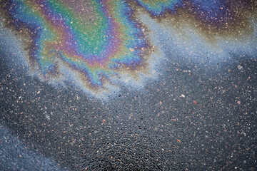 Gasoline spill on wet asphalt.