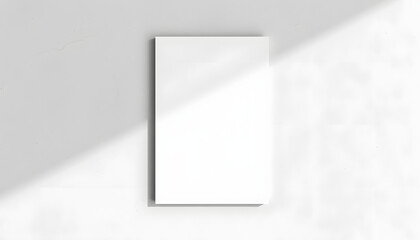 Empty white vertical rectangle poster mockup with soft shadow on neutral light grey concrete wall background. Flat lay, top view isolated with white highlights, png