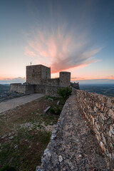 Amazing Sunset at Castle Marvao, a small picturesque village in the Alentejo. Panoramic view landscape. Beautiful landmark in Portugal, with its historic walls and towers.