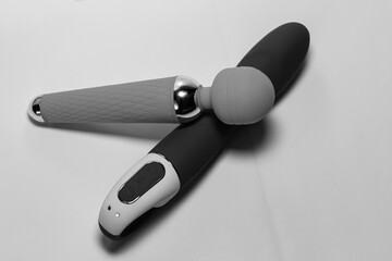 Two erotic Seh Toys of different shapes isolated on a white background.