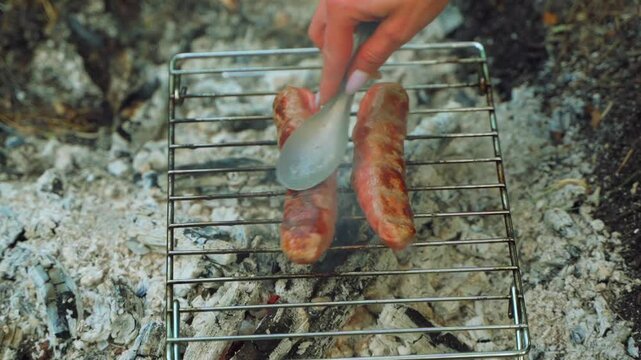 Cooking food and drinks in the forest at a campsite