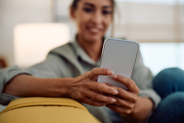 Close up of woman using app on mobile phone.