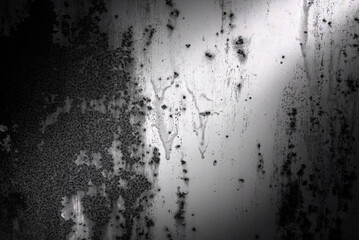 Texture of old rusty metal with scratches and mother-in-law. Abstract grunge metal texture with traces of multi-colored paint