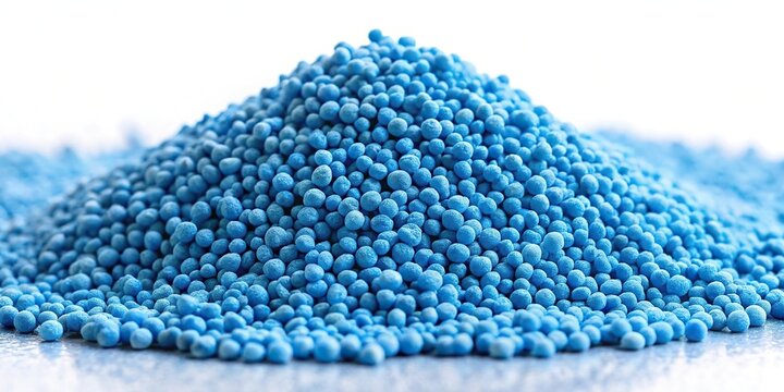 Low angle view of blue chemical fertilizer in granulated format