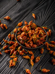 Assorted Dried Capsicum and Fresh Lemon Drop Chili Peppers Highlighting Aji Lemon and Yellow Chili
