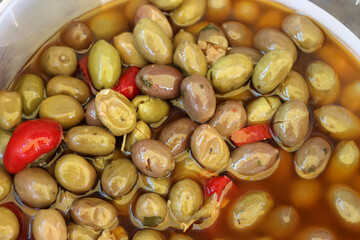 Green olives with chilli pepper for sale