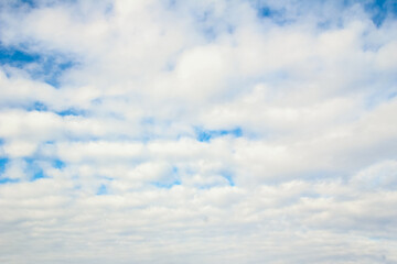 Fantastic soft white clouds against blue sky