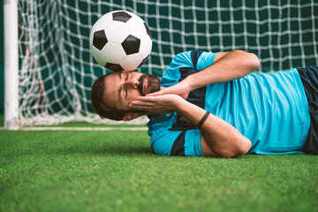 Cinematic image of a soccer freestyle player making tricks with the ball.