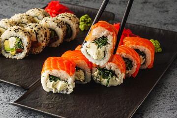 Fresh Sushi Rolls with Salmon and Tuna, Japanese Cuisine on a Gourmet Seafood Plate